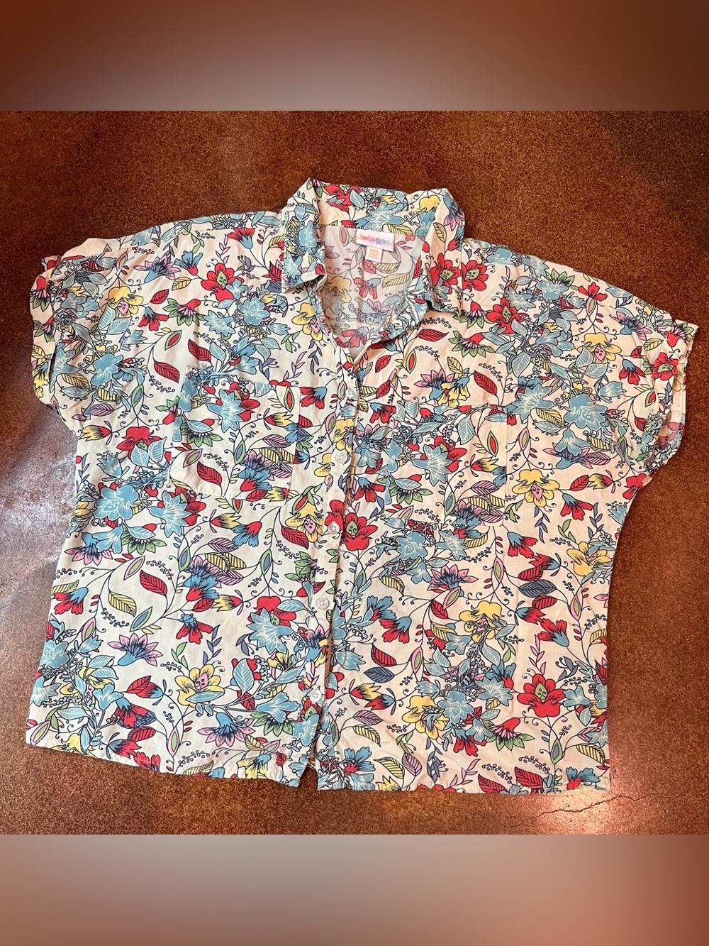 LuLaRoe White Button-Up Bixy Shirt with Red, Blue, Yellow & Green Floral Print